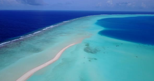 Beautiful above travel shot of a white paradise beach and aqua turquoise water background in colourf