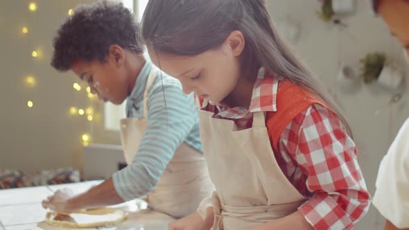 Little Girl Preparing Dough for Baking on Cooking Masterclass