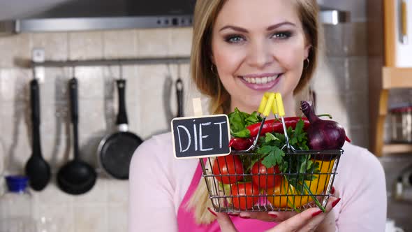 Woman Holds Basket with Vegetables