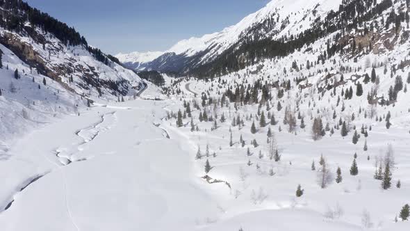 Aerial drone flight over Kaunertal in winter