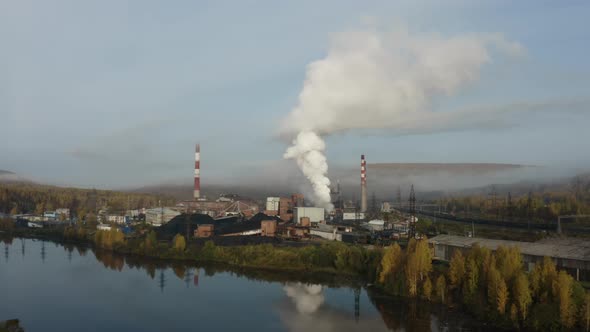 Factory Emitting Smoke Into the Atmosphere