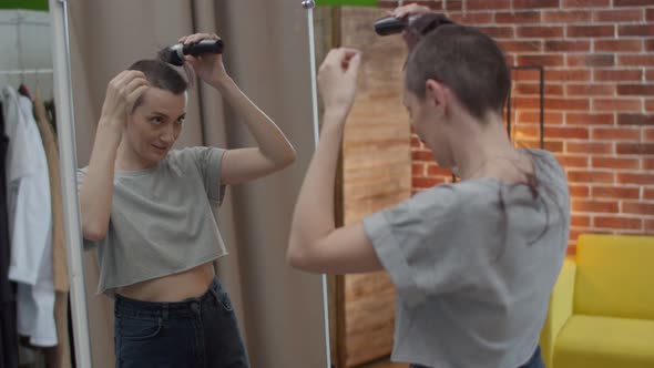 Woman Shaves Her Head Bald with a Hair Machine