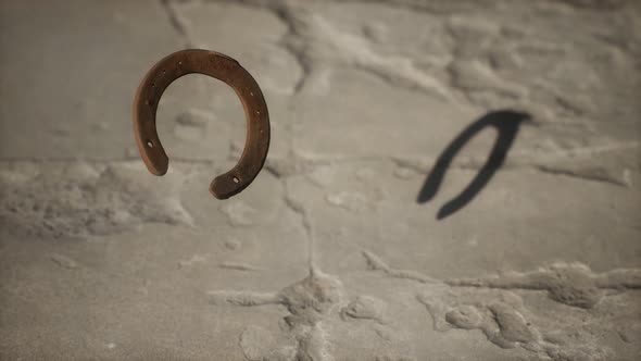 Extreme Slow Motion Old Rusty Metal Horseshoe