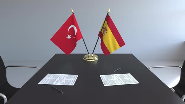 Flags of Turkey and Spain on the Table