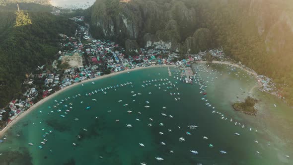 Tourist Boats in a Bay with Blue Water