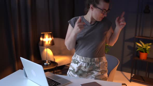 Adult Woman Works in a Home Office