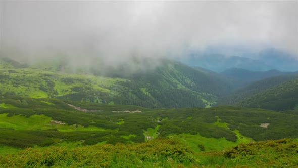 Mountain Peak in Clouds