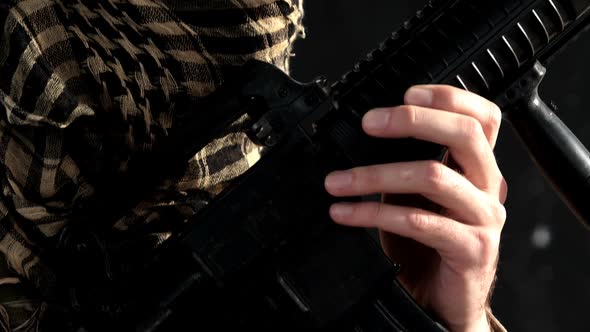 Portrait of soldier holding rifle