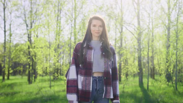 Pretty and Natural Young Woman in Nature