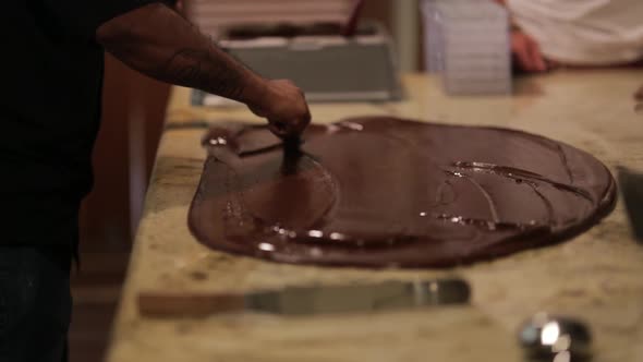 Tempering Chocolate Making Process On Counter In Belize