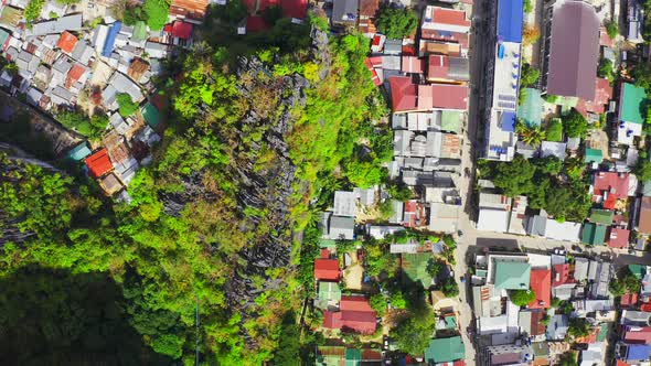 Top View of Houses with Red Roofs Near the Sea and Harbort Port in El Nido, Palawan, Philippines.