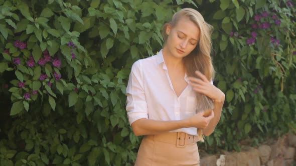 Young beautiful girl posing outdoor