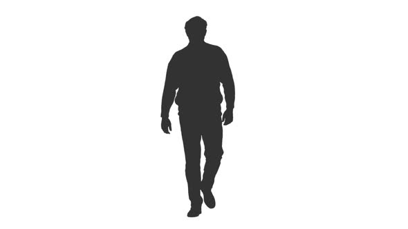 Silhouette of Adult Man Walking in Head Wear