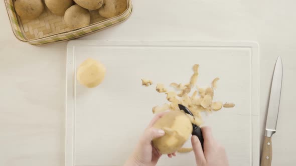 Step by step. Peeling Yukon gold potatoes for classic mashed potatoes