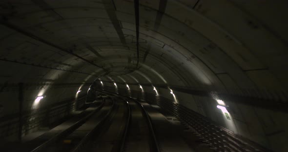 View of Subway Tunnel. Fast Underground Train Riding in Tunnel of Modern City