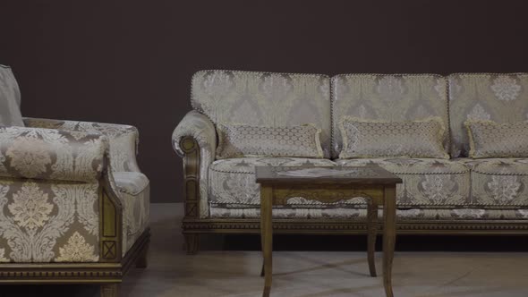 Sofa with Textile Upholstery, Chair and Coffee Table with Carved Wooden Legs