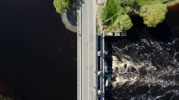 Car Moving on Bridge in Europe Small Town Aerial View