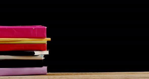 Stack of various book on table