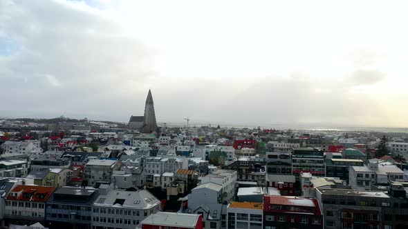 Aerial Of Reykjavík Downtown With Hallgrimskja Lutheran Church In Iceland. Aerial Wide Shot