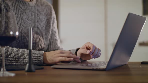 Closeup Fingers Typing Text on Laptop Keyboard