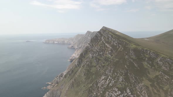 Green Rocky Mountains And Cliffs Of Achill Island In Ireland - aerial shot