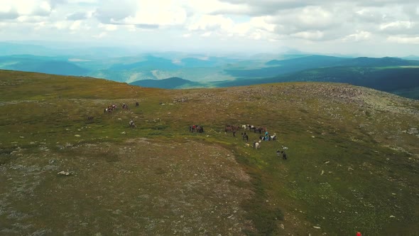 Group Of People At Horse Riding Trips In Altai Mountains