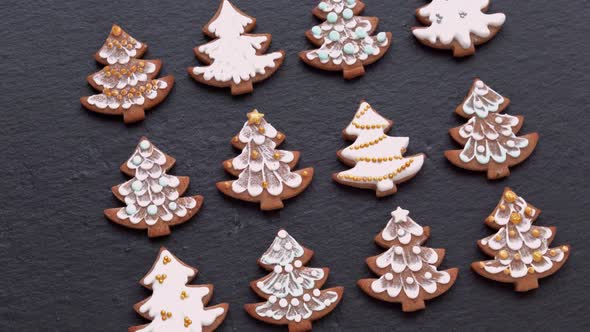 Rotating Gingerbread Cookies Christmas Trees on Slate Table