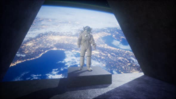Astronaut on the Space Observatory Station Near Earth alt