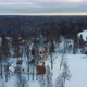 Aerial Top View of the Krimulda Evangelic Lutheran Church in Winter at Sunrise Latvia 4k Video - VideoHive Item for Sale