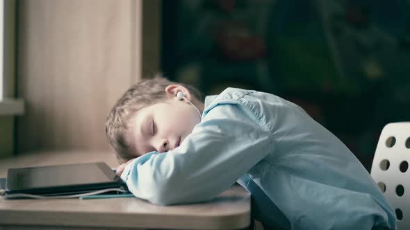 Slow Motion Child Fell Asleep While He Was Doing His Homework