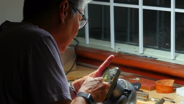 Craftswoman working in workshop