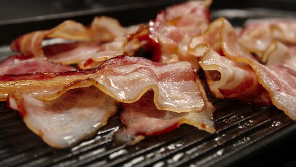 Heap Of Fried Strips Of Bacon On A Pan