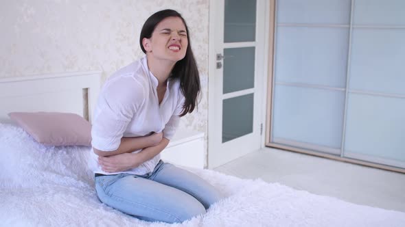 Woman Has a Stomachache