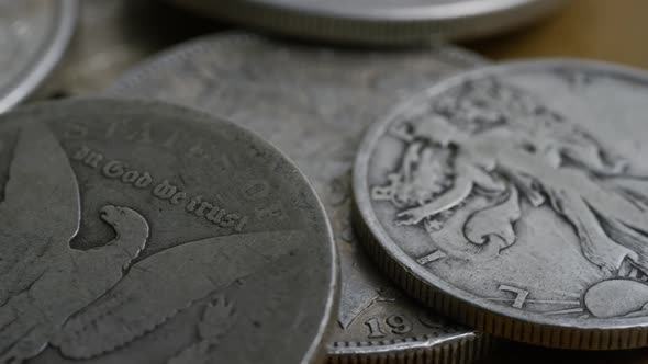 Rotating stock footage shot of antique American coins - MONEY 0095