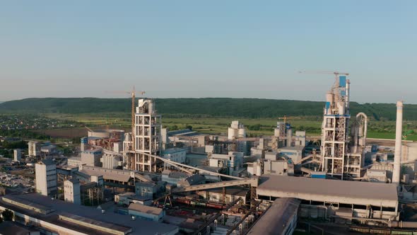 Aerial Drone View of Cement Plant with High Factory Structure at Industrial Production Area at