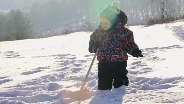 Baby Playing in Winter  