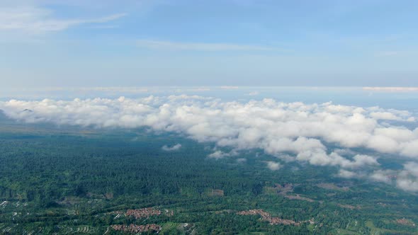 Serene landscape of Java island remote village amid tropical forest, aerial view