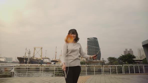 Taiwanese woman playing with a Chinese Yo-Yo