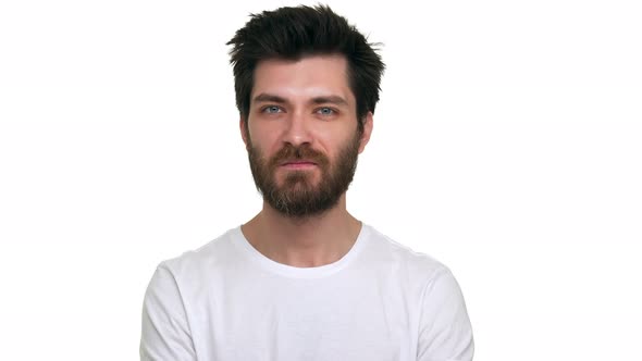 Pissed Man Furiously Yelling Looking at the Camera on White Background