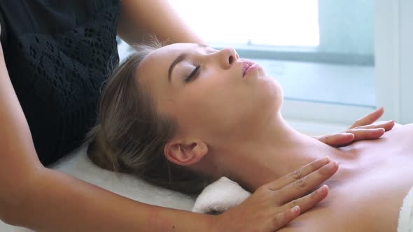 Woman Gets Shoulder Massage Spa By Therapist