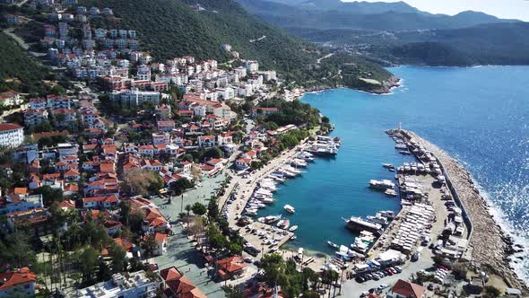 The top view from the drone of Kas resorts, bay, yahts, city in Mugla in Turkey