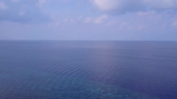 Aerial drone panorama of exotic bay beach by blue water and sand background