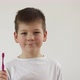 Kid Boy Brushing His Teeth Using Tooth Brush and Oral Paste Cleaning Teeth - VideoHive Item for Sale