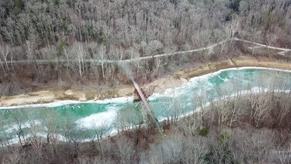 Bridge and Mountain Cliff Reveal