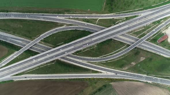 Aerial view of highway and overpass. Road junction, highway intersection top view. 