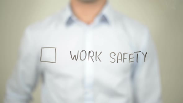 Work Safety, Businessman Writing on Transparent Screen