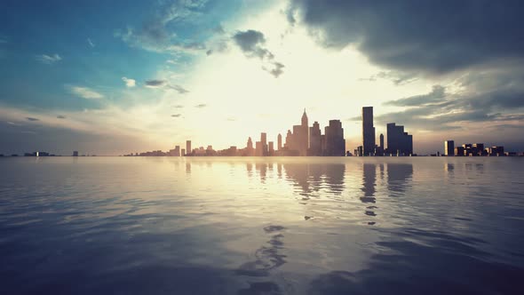 Skyline with Skyscrapers and Sea at Sunset