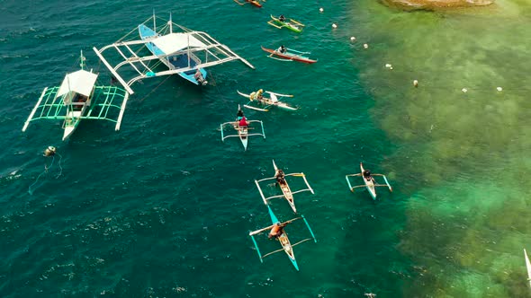 Tourists Snorkeling in Coral Reef Moalboal Philippines