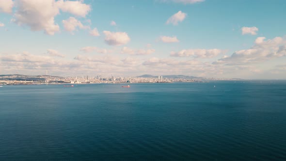 istanbul cityscape view from drone while ships crossing bosphorus