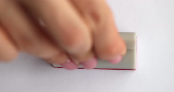 Person Puts Coronovirus Omicron Stamp on Paper Closeup